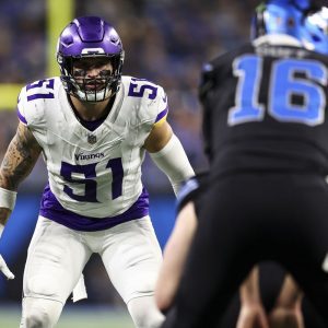 a football player getting ready for a play