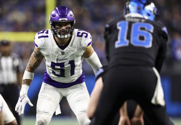 a football player getting ready for a play