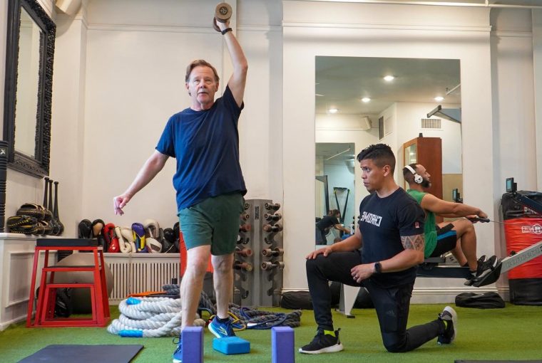 a man training a client