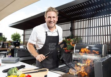 curtis stone cooking in his kitchen