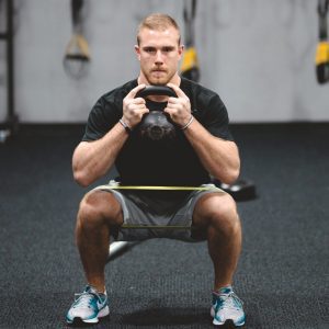 a man performing an exercise for injury prevention