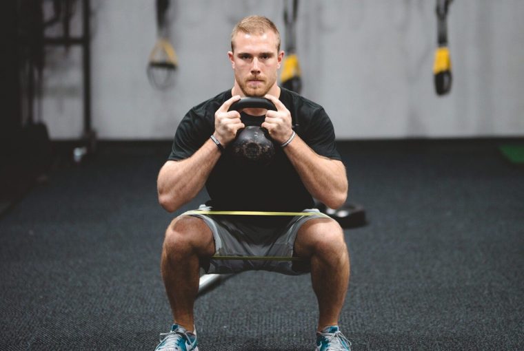 a man performing an exercise for injury prevention