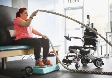 a woman with limited mobility exercising