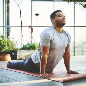 a man doing upward facing dog
