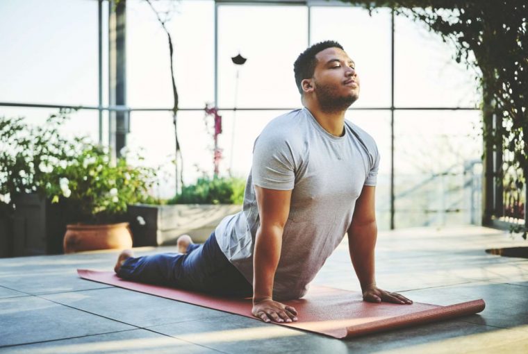 a man doing upward facing dog