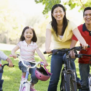 a family going for a bike ride together