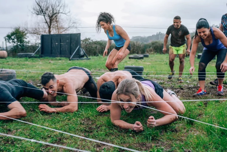 a group of athletes training for an obstacle course race