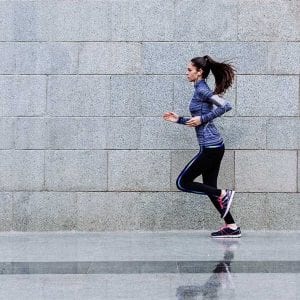 a woman running outdoors