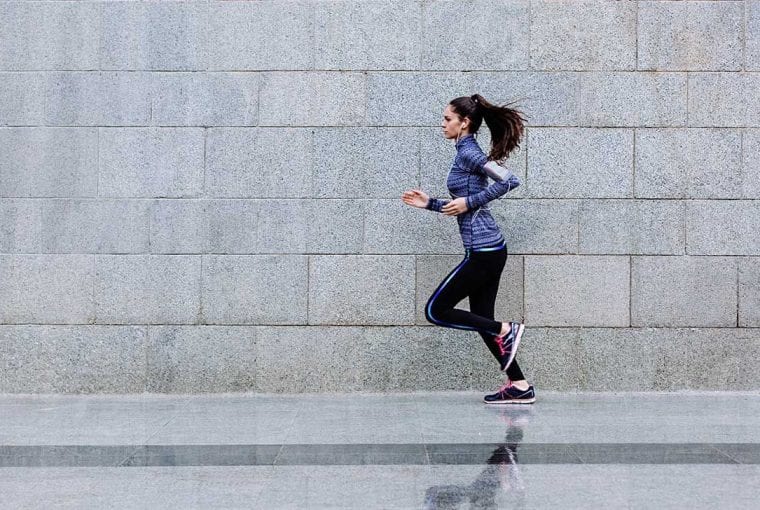 a woman running outdoors