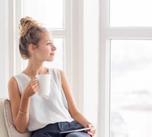 Woman drinking a cup of tea