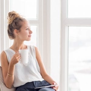 Woman drinking a cup of tea