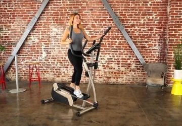 Worman exercising with Elliptical