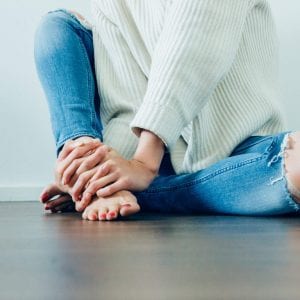 Woman Rubbing Feet
