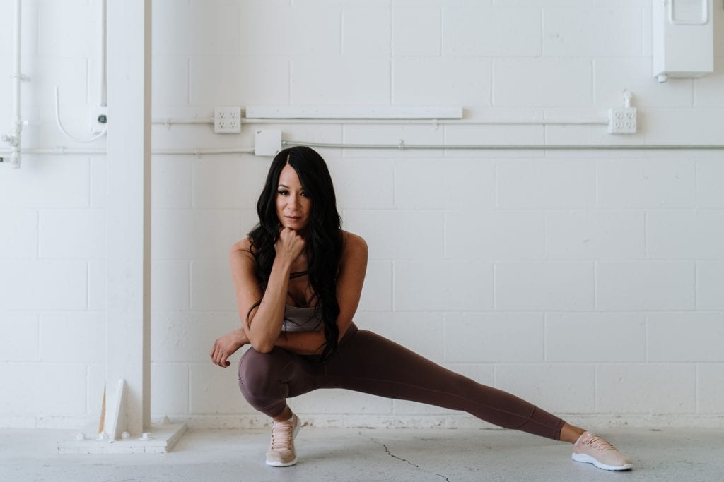 woman stretching in yoga gear