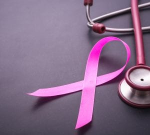 breast cancer ribbon and stethoscope