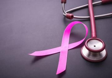 breast cancer ribbon and stethoscope