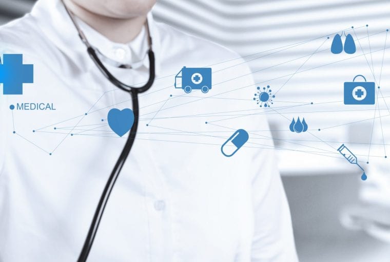 medical professional with a number of health icons in front of them