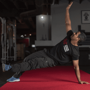 man doing exercises on the floor