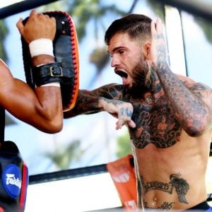 2 athletes practicing MMA