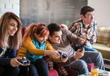group of young adults playing a video game