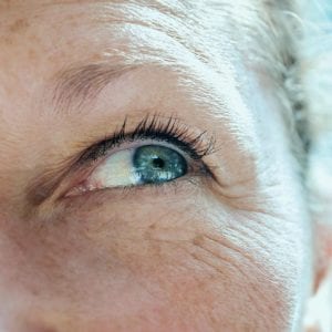 older woman with close up of her eyes
