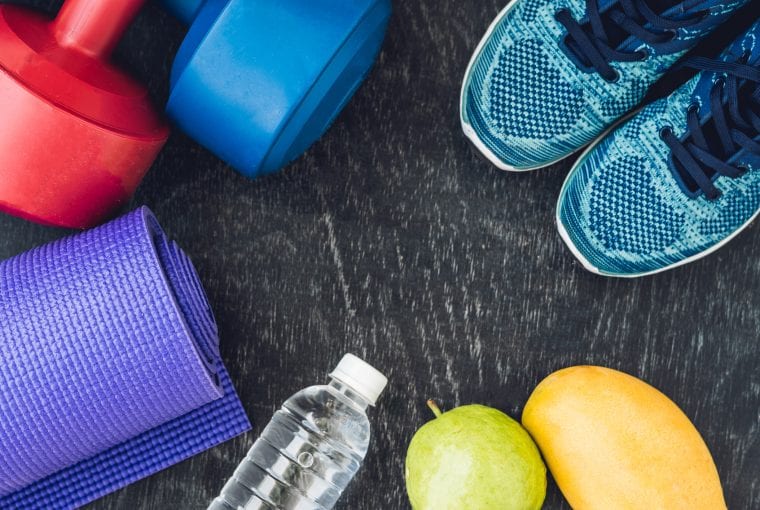 fitness items placed on a workout mat