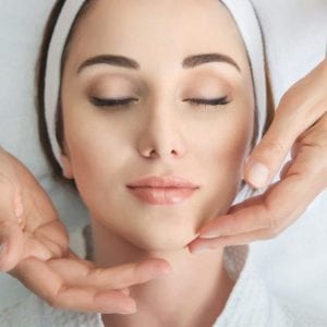 woman getting a facial treatment