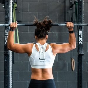 woman lifting a barbell