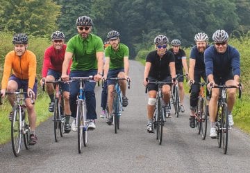 a group of adults riding bikes