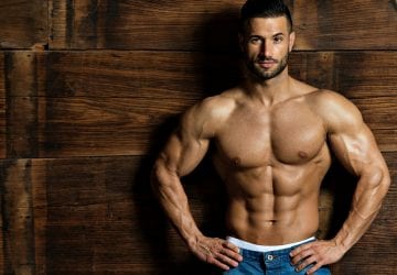 muscular man posing without a shirt