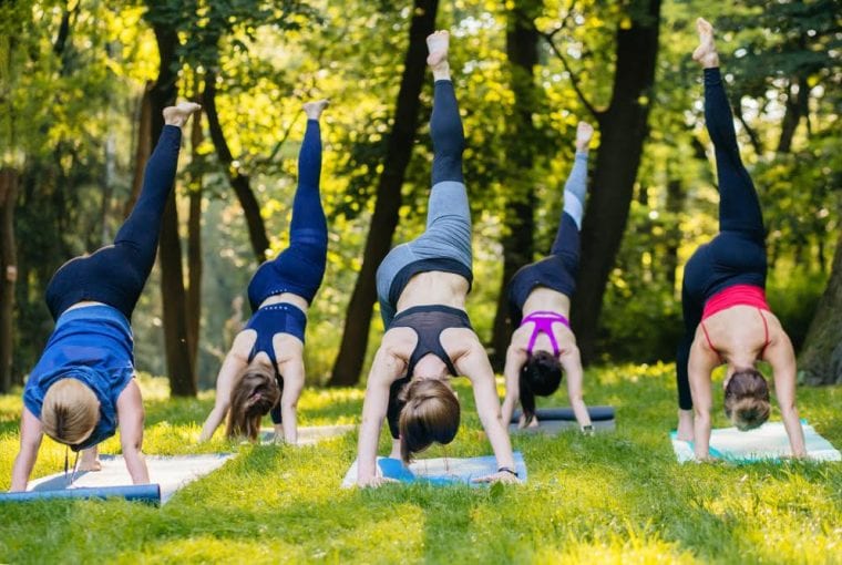 women doing a workout in the park