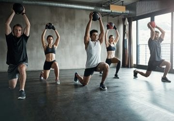 people doing a group workout at the gym
