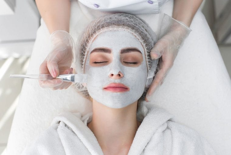 woman seeing a dermatologist