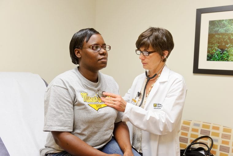 a patient seeing their doctor