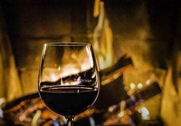 wine in front of a fire