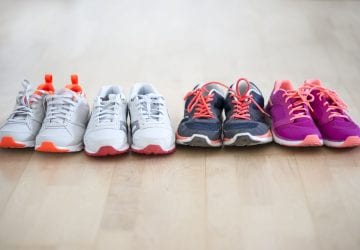 a lineup of different pairs of walking shoes
