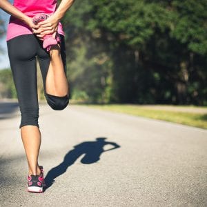 woman stretching before going on a run