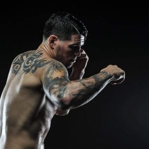 man shadow boxing in the gym