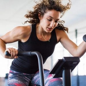 female on a elliptical machine