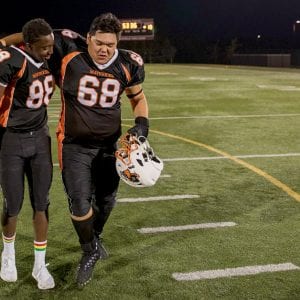 a couple teen football players