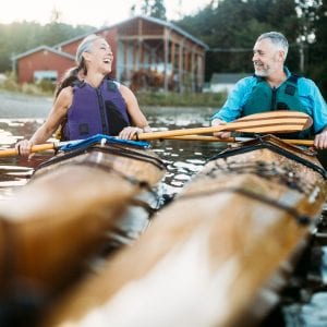 a senior couple kayaking