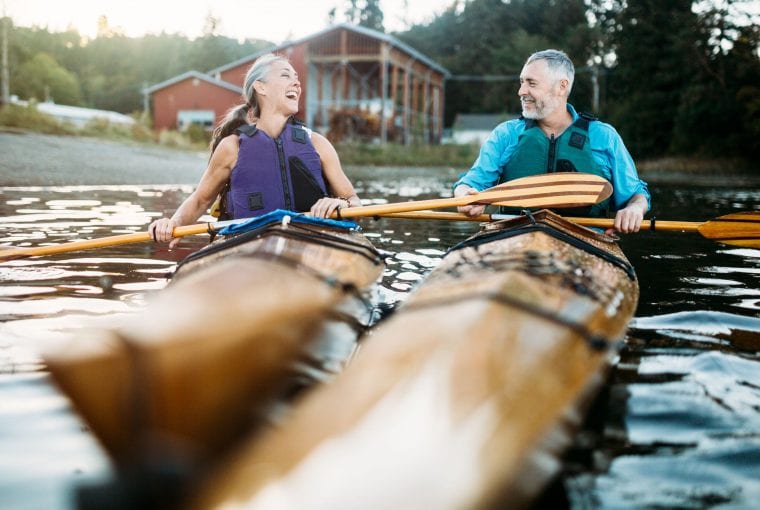 a senior couple kayaking