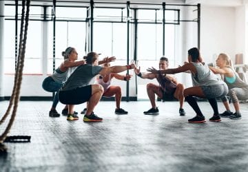 Shot of a fitness group working out at the gym
