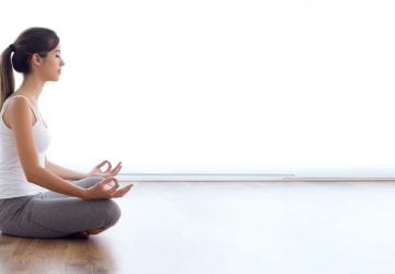 a woman silently meditating