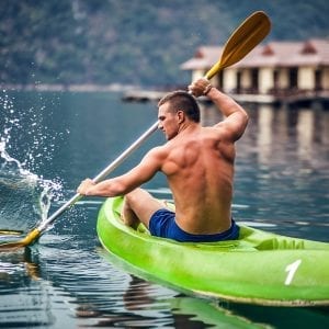 strong man kayaking