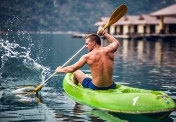 strong man kayaking