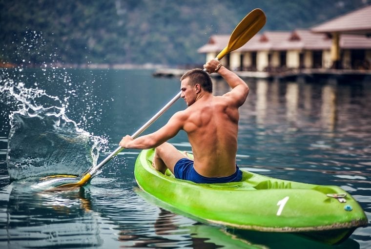 strong man kayaking