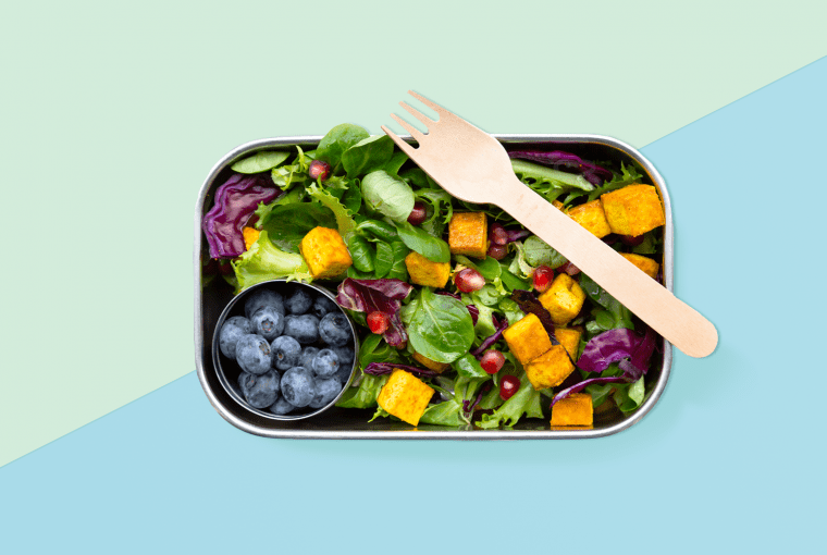 a take out container of healthy food