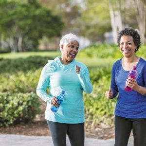 a mother and daughter working out