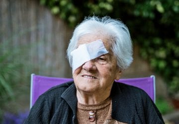 an elderly woman with macular degeneration